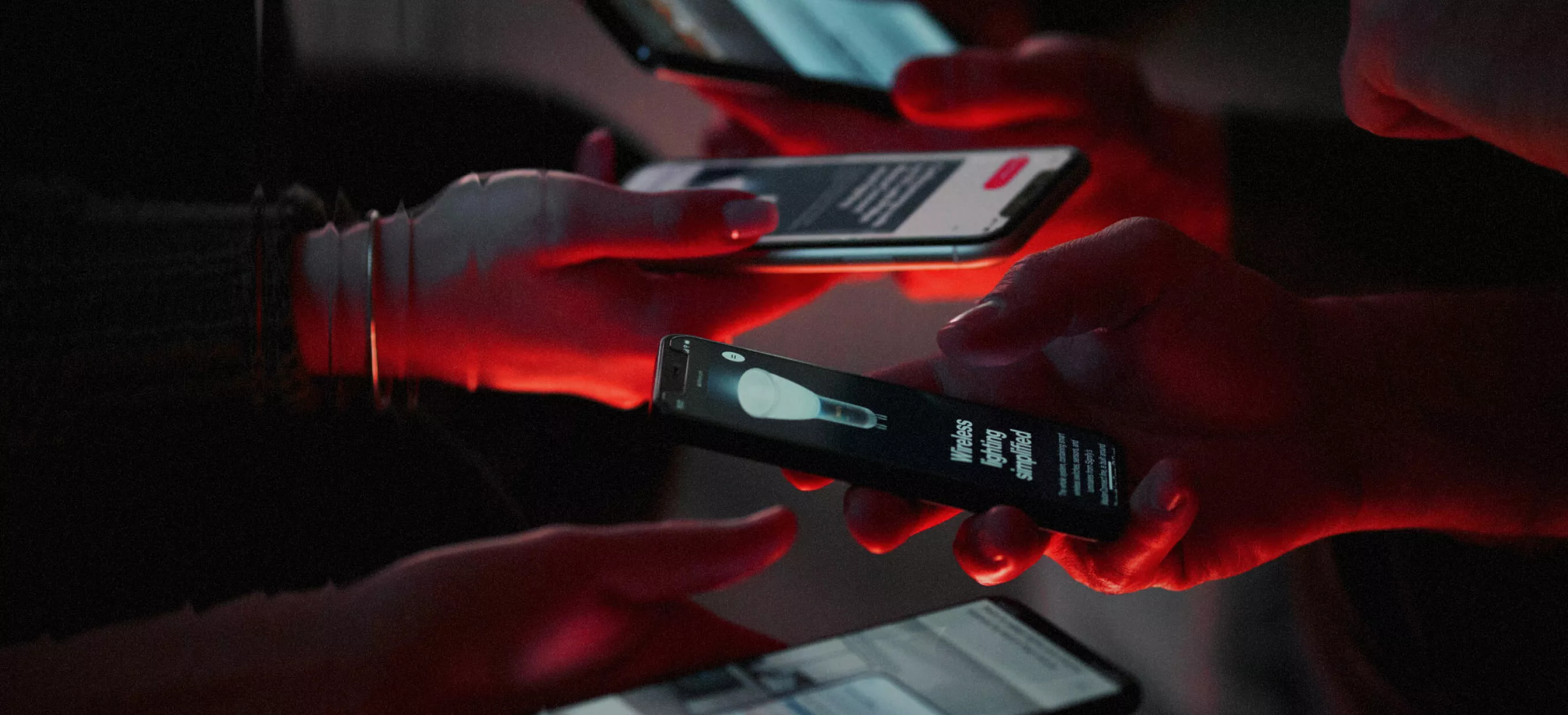 Cybersecurity hero image - people holding phones